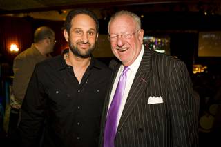 Screenwriter Dustin Abraham poses with former Las Vegas Mayor Oscar Goodman during a 